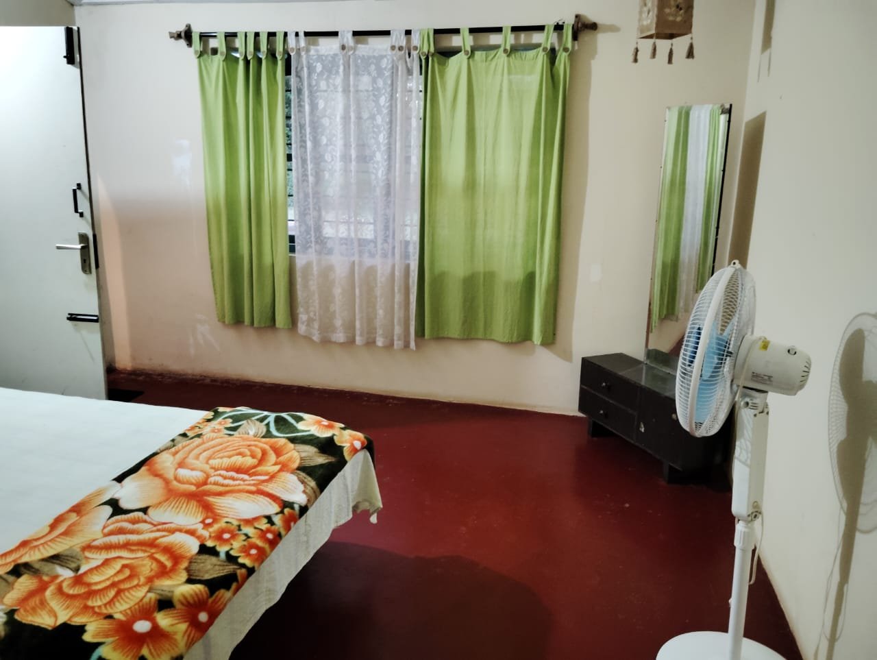 Twin room at Coorg Inn Stay, a scenic coffee estate Homestay located just 9 Minutes drive from Dubare Elephant Camp.