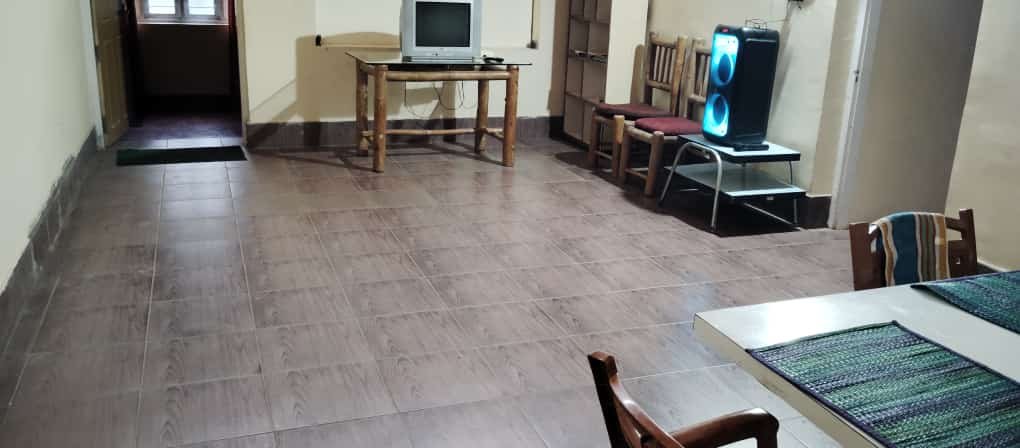 Amenities in common living room at Coorg Inn Stay, a hidden gem nestled deep within a lush coffee estate.